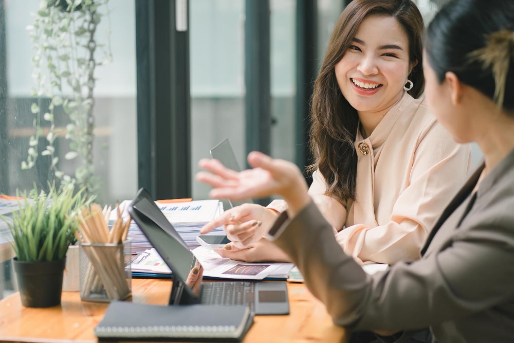 video-call Colleagues discussing a business project at a desk
